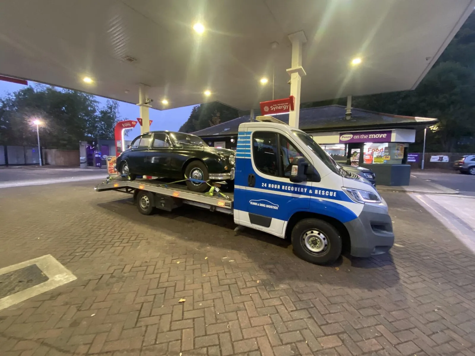 Classic Jaguar collected at night by Clark & Sons Logistics